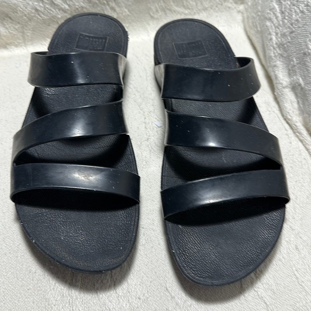 Black Fitflop slip on sandals. Waterproof rubber like Crocs. Wobbleboard heel.